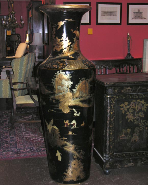 Pair of lacquered chinoiserie papier mache black and gilt oversize vases.