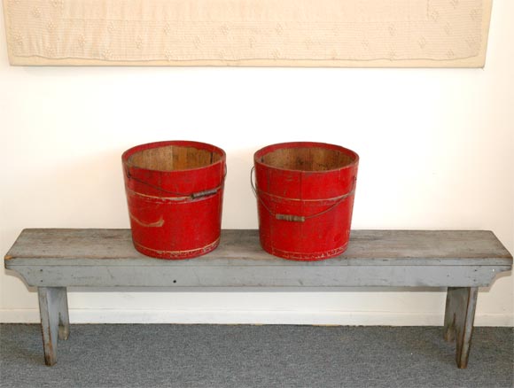 PAIR OF RED PAINTED FIRE BUCKETS WITH BAIL HANDLES