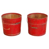 PAIR OF RED PAINTED FIRE BUCKETS WITH BAIL HANDLES