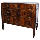 An Art Deco chest of drawers.