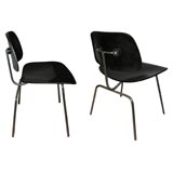 Pair of Charles Eames DCM  molded plywood on chrome frame chairs