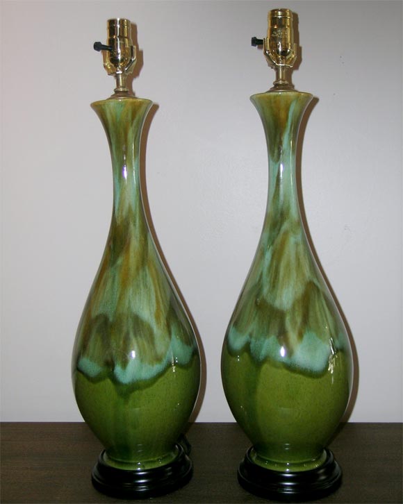 Pair of ceramic lamps with a peacock drip glaze