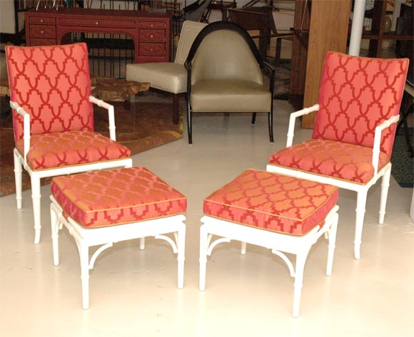 Pair of bone lacquered faux-bamboo armchairs silk fabric and gold piping.  Ottomans are no longer avilable. Price is for pair of chairs.
