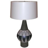 Brown ceramic lamp with blue fish design