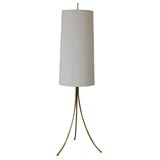 A Brass Tripod Floor Lamp.  In the manner of Gibbings.