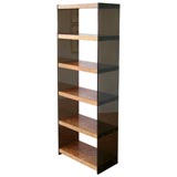 Burled wood and lucite bookshelves by Flair