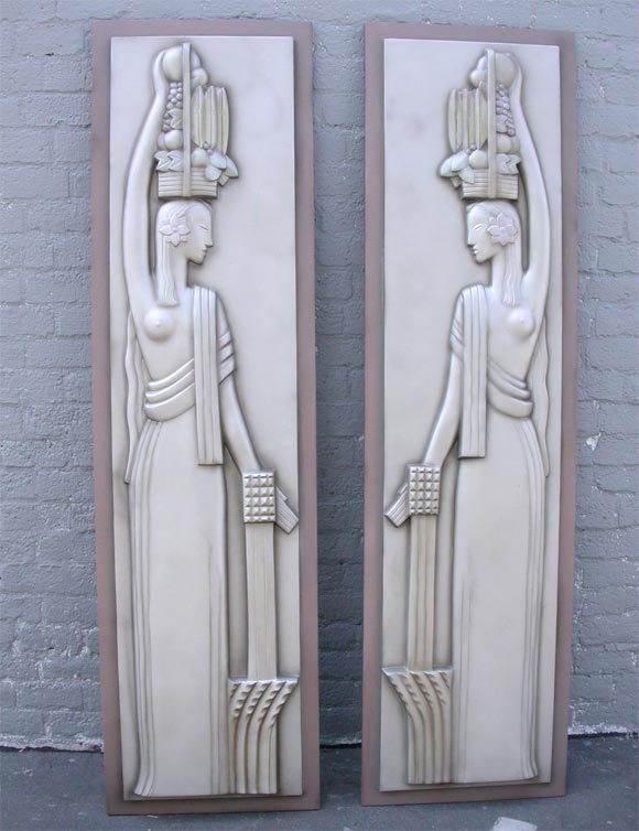 These were originally designed for the Agricultural  pavilion at the 1933 World's Fair in Chicago.  We have created a mold from the original pair, and are producing these in a limited number.  They are permanently mounted on a solid wood board and