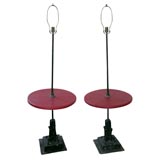 A Pair of Red Leather and Metal Floor Lamps