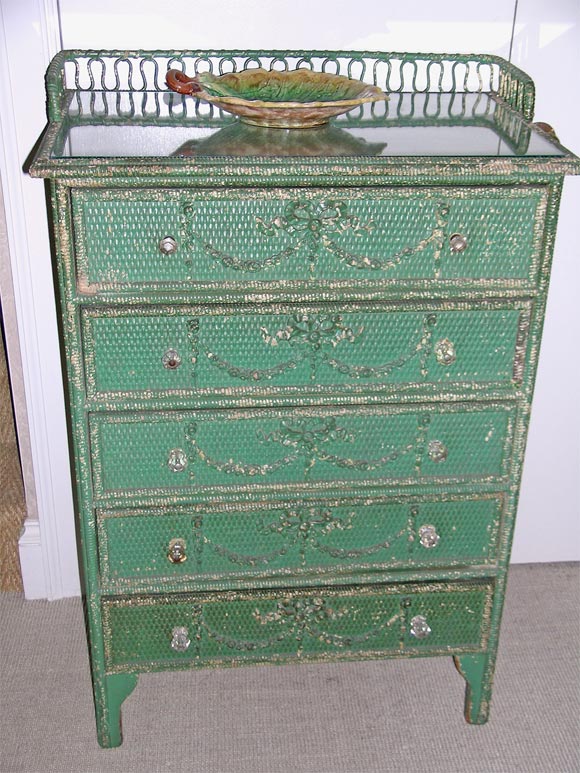 Very Attractive Victorian green painted 5-drawer wicker chest with original hardware. The top shelf has a glass top. The wicker gallery has no breaks, circa 1900.