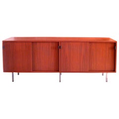 Walnut credenza w/leather tab pulls by Florence Knoll