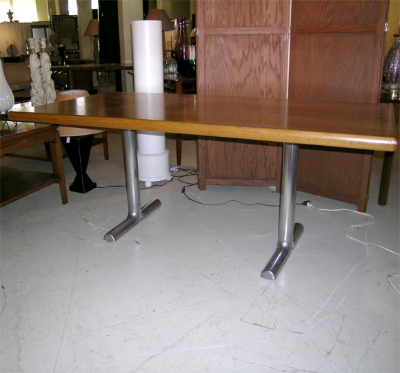 Oak on aluminum base table.