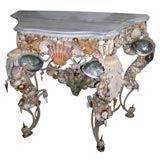 shell encrusted wrought iron marble top console table