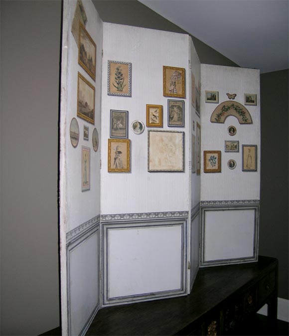 a four panel wallpaper screen decorated with cut paper, paint and decoupage.