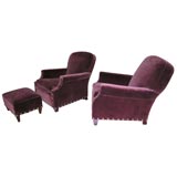 Pair of red velvet club chairs