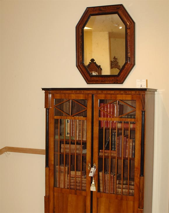Mid 19th Century Octagonal Dutch Tortoise- Patterned Bone Mirror, in the 17th- century Dutch taste, With a canted, ogee- molded frame with <br />
ebonized Inner Beveled Frame.<br />
Circa 1850.