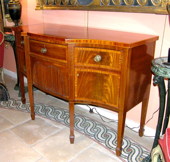George III (Hepplewhite)Serpentine Mahogany Sideboard