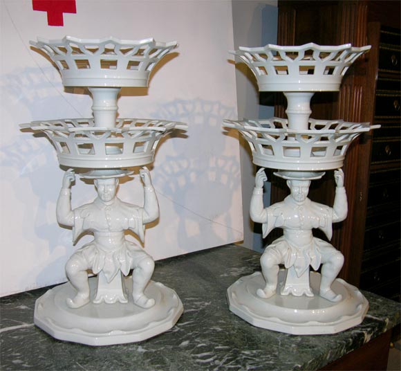 A large pair of Portuguese Porcelain Figural Chinoiserie two-tierd sweetmeat baskets.