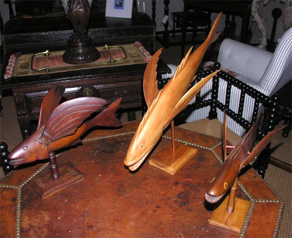 A Large Collection of Hand Carved Pitcairn Island Flying Fish 4