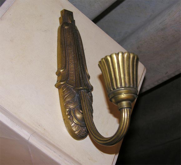 Bronze wall sconces. They are pictured upside down.