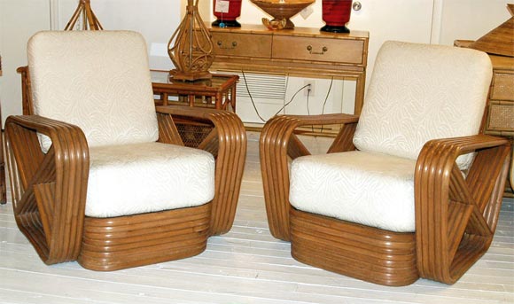 Fine & rare matched set of four rattan Paul Frankl (Godfather) inspired club / lounge chairs.  Very comfortable 5-band forms.  Priced for the set of four.  These chairs are not exact matches as each chair was created by hand, but they are a very
