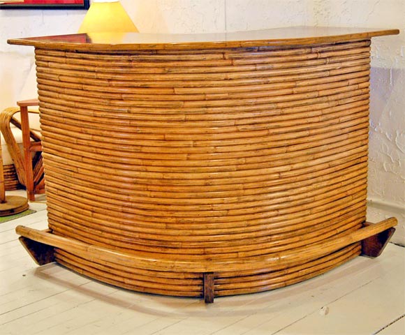 Fine & rare rattan bar with mahogany top.  We carry an extensive collection of vintage rattan. Please e-mail us if your looking for a specific item.***Contact Information: AOL (American Online) users may experience difficulties sending emails to us