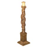 Patinated carved wood twisted column with grapevine motif