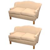 Pair of small French settees in the style of Jean-Charles Moreux