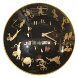 Reverse Painted Black Glass Clock with Gold Lettering