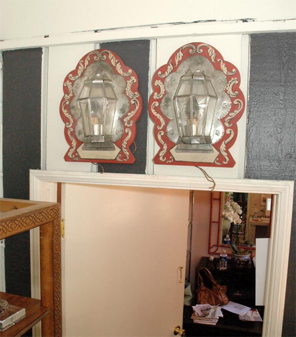 A Pair of Hand Painted Wood and Hammered Tole Decorative Wall Lanterns.
