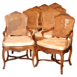 Set of Eight Carved Walnut and Caned Chairs Louis XVI Style