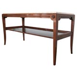 A Walnut 
Travertine Console Table designed by Tommi Parzinger