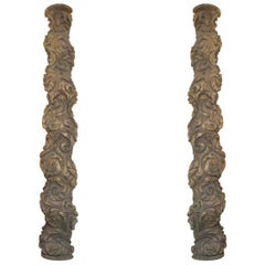 Paire de demi- colonnes sculptées torsadées