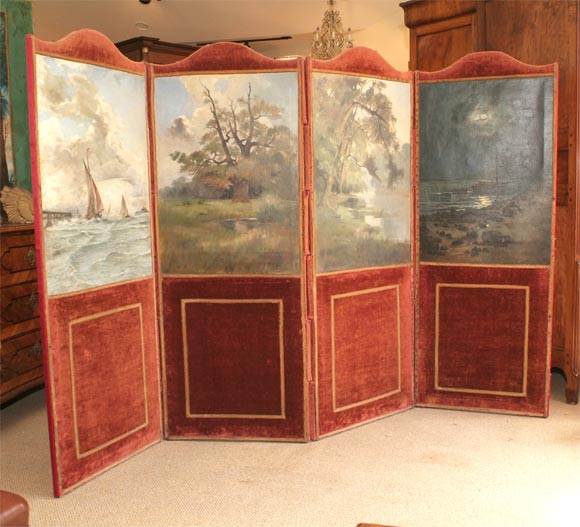 Four large landscape paintings mounted on an antique velvet screen.