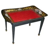 A chinoiserie lacquer tray table