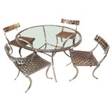 Striking Cast Aluminum Klismos Dining Table with Chairs