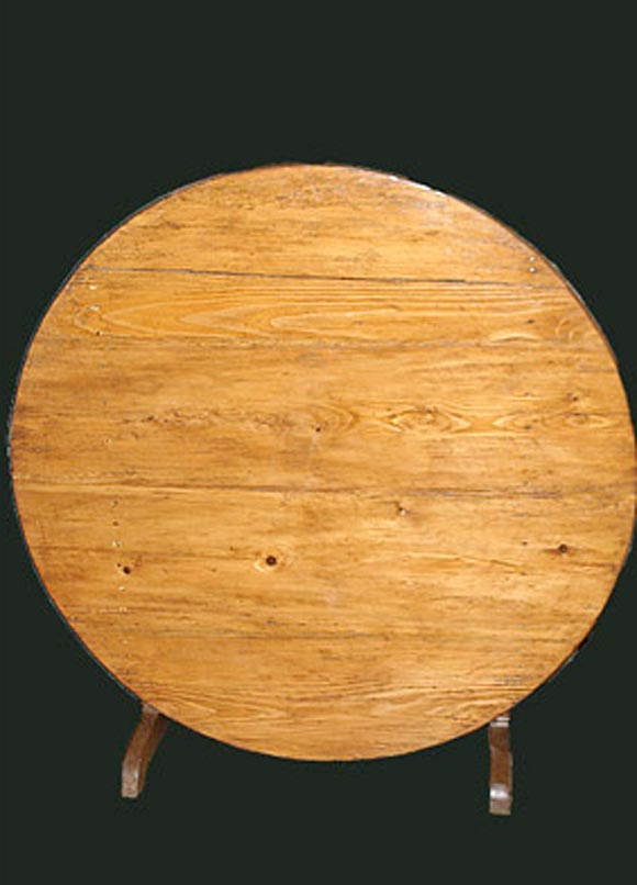 ROUND WINE TABLE WITH A WALNUT LYRE BASE AND AN ASH TOP.  CIRCA 1880.