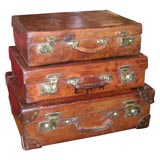 Stack of Three Antique Leather Suitcases