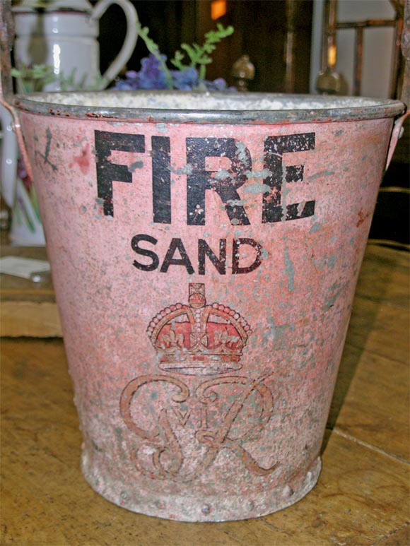 An Early Fire and Sand Bucket with Original Paint and Crown. Overall Height with Handle up is 18