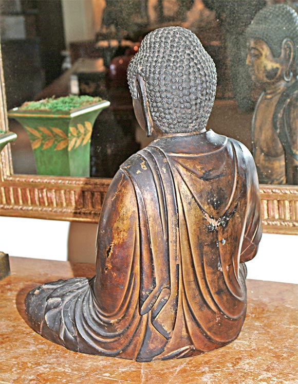 A rare large and early wood and lacquered Japanese Buddha Sculpture late Kamakura or early Tokogawa