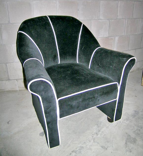A lovely pair of Andree Putman chairs in black velvet.