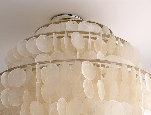This is part of the Hydromedusa line of Capiz shell lights that we carry by Gwen Carlton.  This is the largest and most lush of the collection.  This can be custom sized as each light is made to order.  The light pictured has bleached shells with