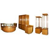 Vintage Art Deco Style Showcases 21+ Cabinets in Flamed Maple & Brass