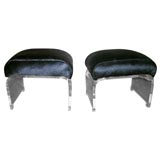 BEAUTIFUL PAIR OF LUCITE AND COWHIDE OTTOMANS.