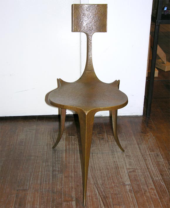A very delicately balanced chair in bronze by furniture sculptor Yves Pagart.