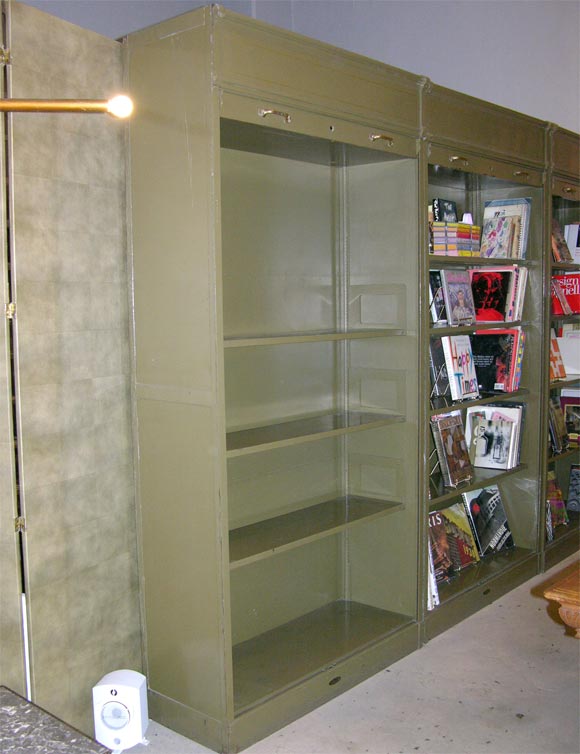 STEEL AND BRASS SHELVING UNIT