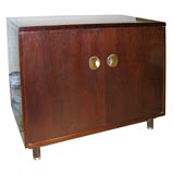 Walnut cabinet with round hardware
