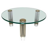 A Glass and Lucite Round Low Table by Abrizzi.