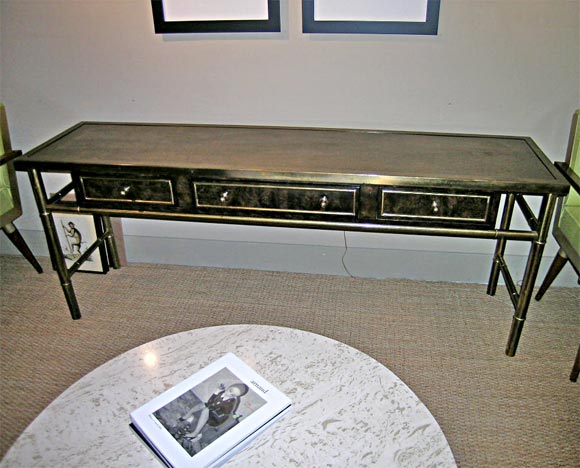 Brass console with acid etched top and burl cabinet