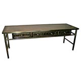 Brass console with acid etched top and burl cabinet