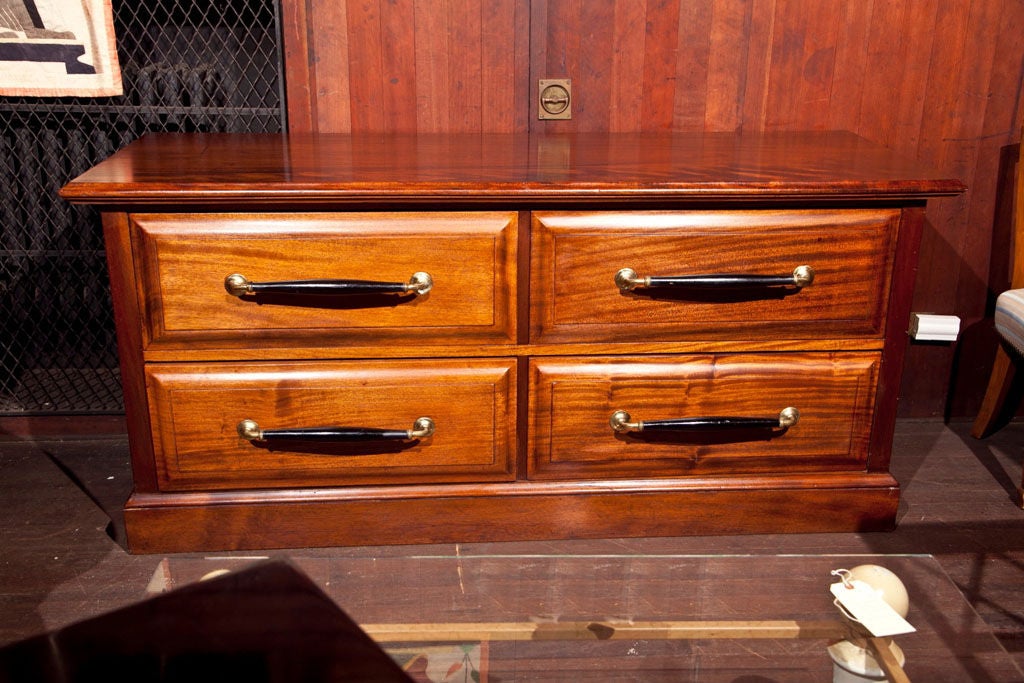 Four large drawer chest with large handles.